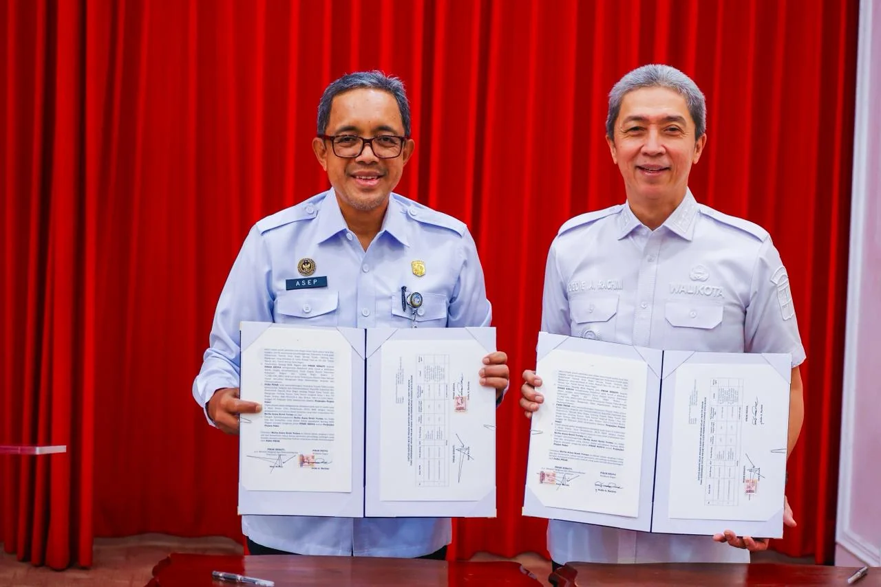 Wali Kota Bogor, Dedie A. Rachim bersama Sekretaris Jenderal Kementerian Imigrasi dan Pemasyarakatan (Kemenimipas), Asep Kurnia melaksanakan Penandatanganan Perjanjian Pinjam Pakai Barang Milik Negara (BMN) Eks Kantor Imigrasi Kelas I Non TPI Bogor.Dok-Di